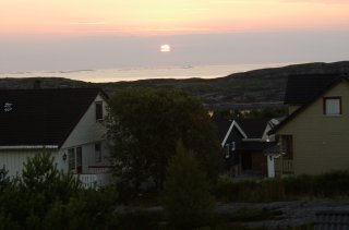 Midnight sun, 2:00A.M. view of sun over Atlantic Ocean, Kristiansund 2003.